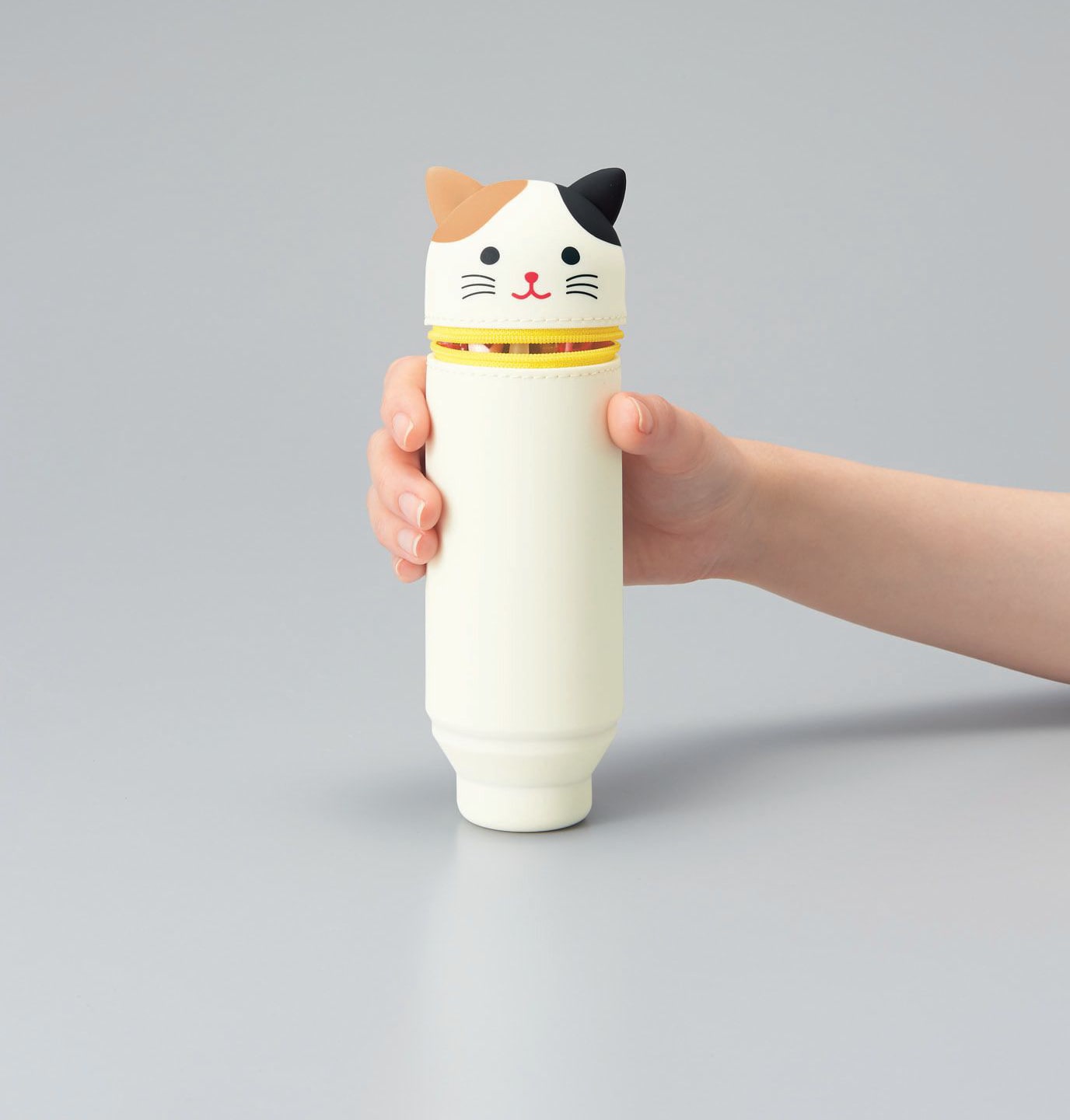 Cal Cat PuniLabo Stand Up Case zips closed for transportation.Transforms into a cup to hold your favorite pens & pencils upright on a desk.